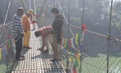 माघे सङ्क्रान्ति मेलालाई देवघाटमा झोलुङ्गे पुल मर्मत